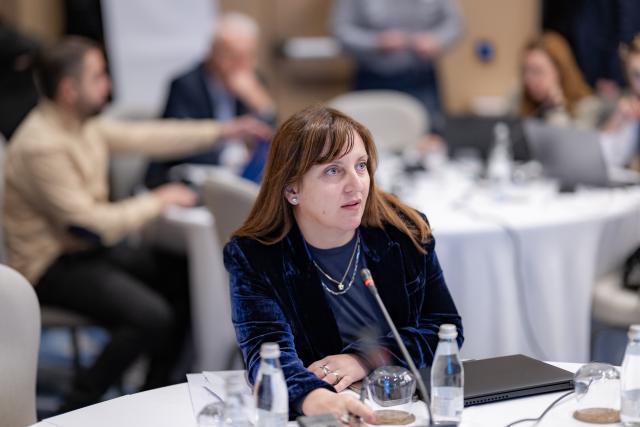 Participant discussing at workshop