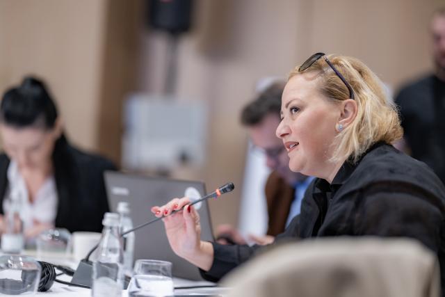 Participant discussing at workshop