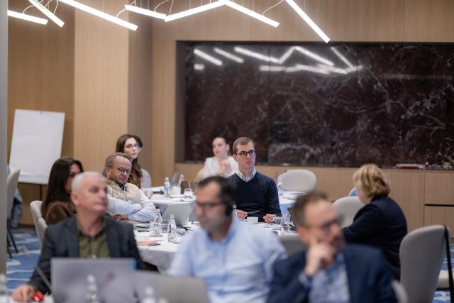 Participants follow discussion at workshop