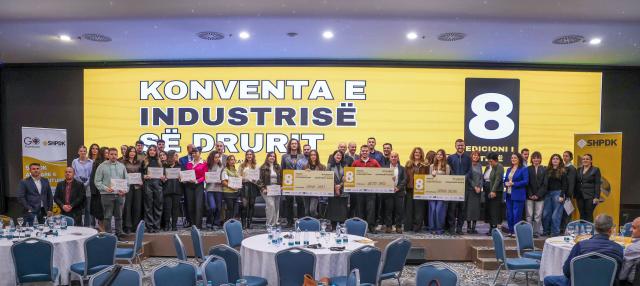 Student winners of competition posing for a family photo at Wood Convention kosovo