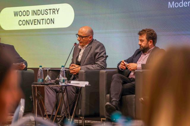 Panelist speaking at Kosovo wood convention 2025