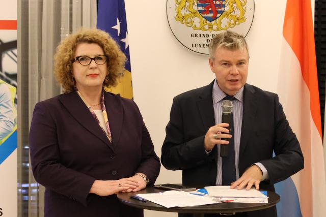 Ambassador and Minister presenting LuxAid Demonstration Fund to business community
