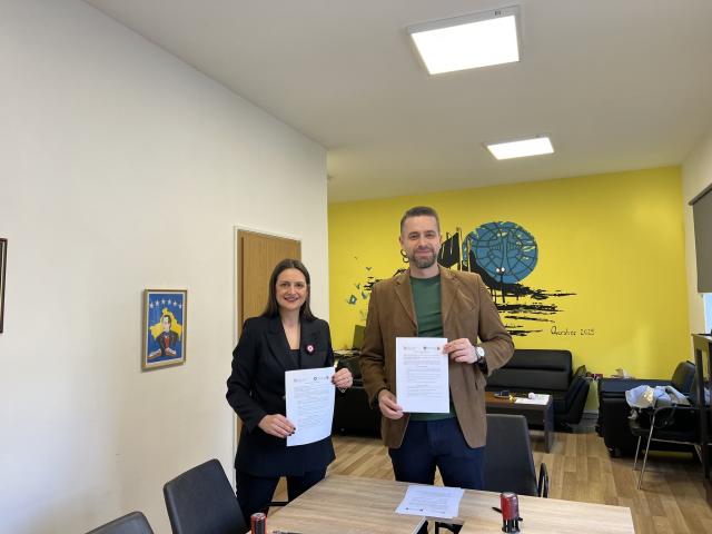 LuxDev partner D4D with Municipality representative posing after signing memorandum