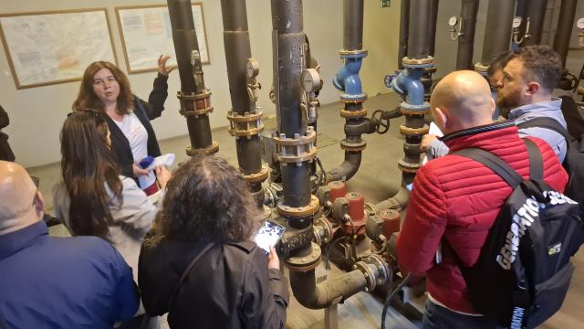 Energy expert demonstrating inspection for participating experts