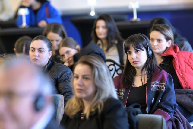 Audience listening to stories shared by women in energy