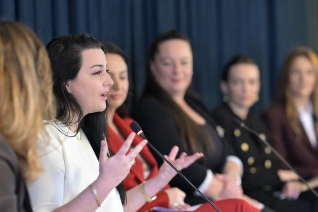 Women panelists while sharing their stories  