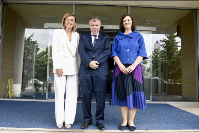 Government ministers and Luxembourg ambassador posing ahead of the launch