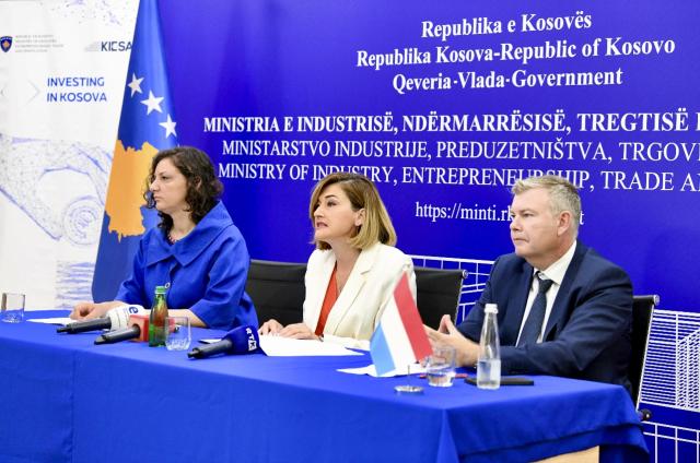 Government ministers and Luxembourg ambassador at a press conference