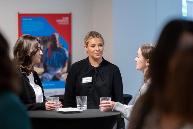 Three ladies in a networking cocktail