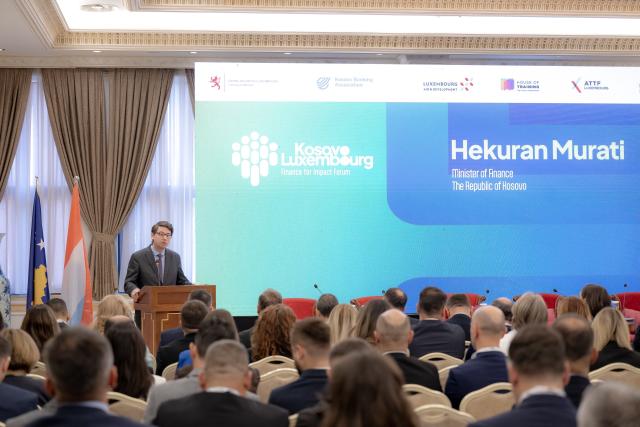 Finance Minister speaking to the audience of the Forum